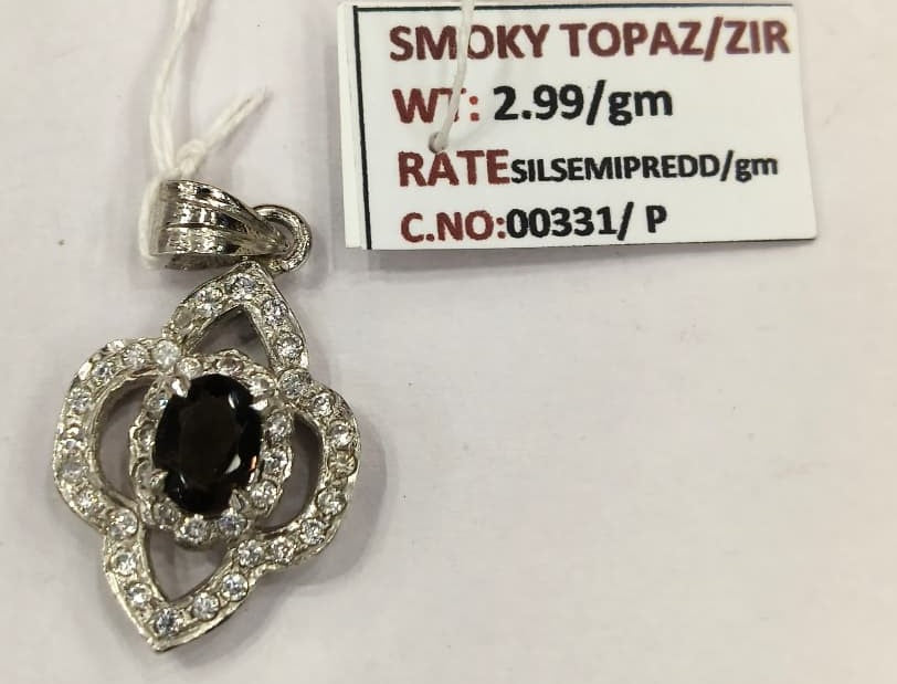 2.99/GM SMOKY TOPAZ /ZIRCON (1650)